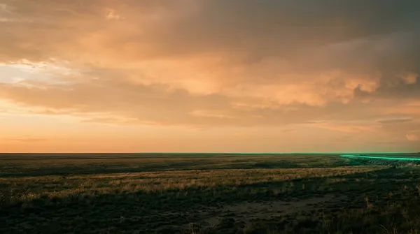 Big-sky eastern New Mexico landscape near Clovis at golden hour.